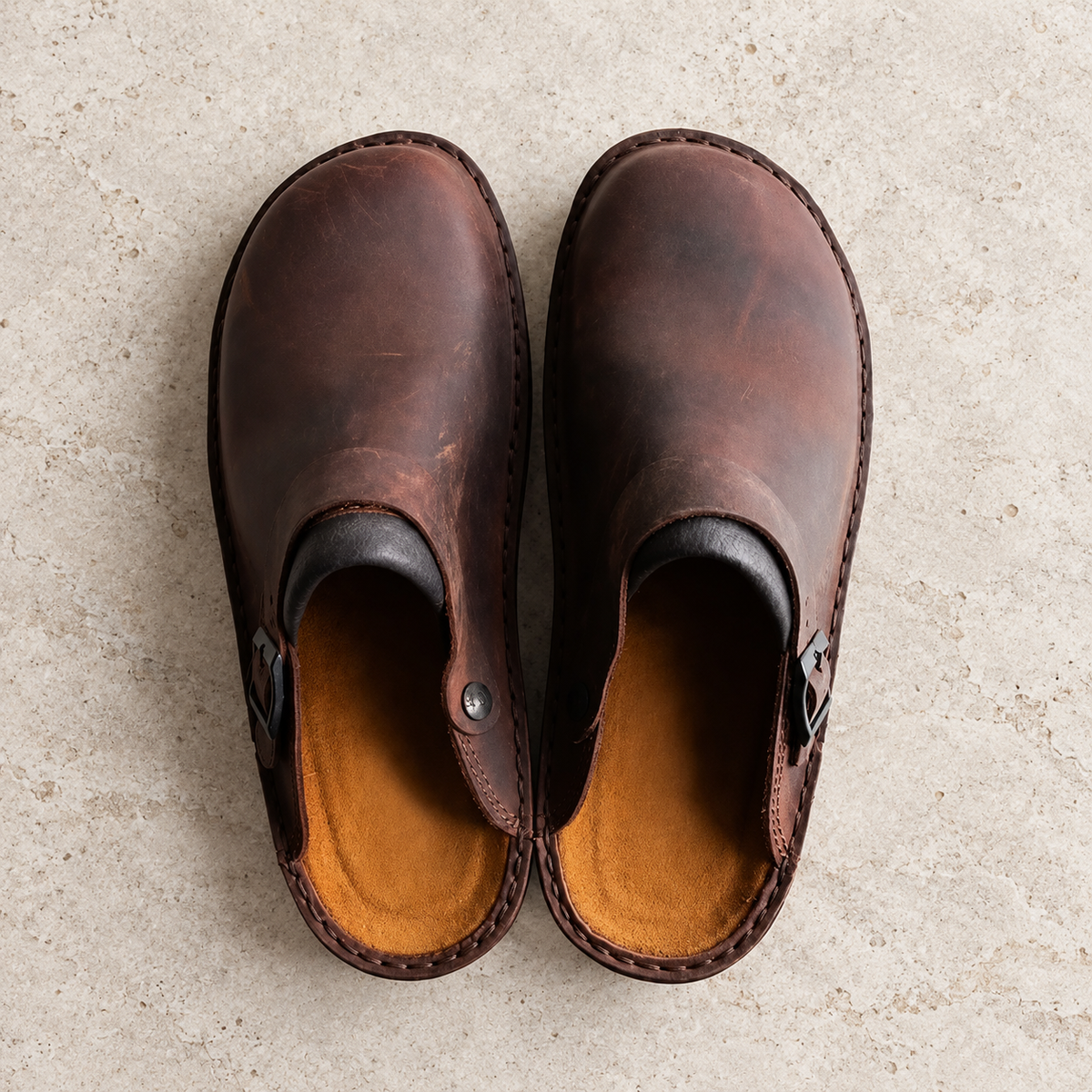 Matera Buckle Leather Clogs